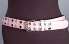 1-1/2" pink leather belt with two rows of alternating stars and eyelets, nickel polish double prong buckle and plain leather keeper
