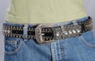 black 1-1/2" leather strap belt with central row 1/2" white rhinestones banked by double rows of knob studs, western-style cast squash blossom buckle and keeper