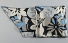 satin belt scarf, tropical leaves and petals in white, silver, gray and blue against a black field