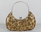 small tri-tone leopard spot metal mesh crescent shape handbag