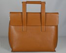 tan grain finish messenger handbag with flap closure and square handles