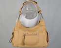 tan designer jean frame bag with zippered pockets jean seams