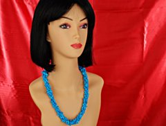 model with turquoise necklace