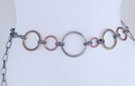chain belt, stippled antique gold, silver and bronze circles of various sizes linked by double pewter stippled oval links; identical links form the extension chain