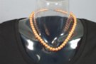 orange lustrous bead necklace with clasp, 1/4" beads