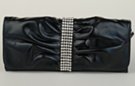 pleated soft leatherette black evening bag with vertical rhinestone band
