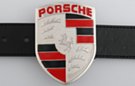 Porsche crest on shield-shaped belt buckle