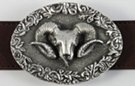 oval pewter belt buckle, big horn sheep skull on wood texture with leaf work