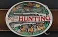 rather-be-hunting printed on oval belt buckle with scenery