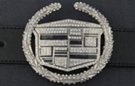 rhinestone and chrome belt buckle with Cadillac crest and wreath