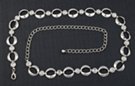 alternating silver ring and clear rhinestone chain belt