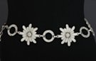white daisy chain and silver washer ring chain belt