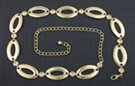 alternating gold ovals and clear rhinestone chain belt