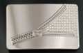 chrome and rhinestone belt buckle with big zipper