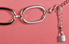 silver chain belt made of rounded rectangular links