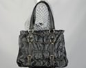 ruched soft leatherette tote with vertical trunk strap accent