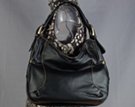 black hobo tote with soft shoulder strap and oversize gold buckles