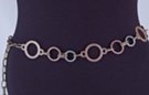 chain belt: collage of sandstone, silver and bronze circles linked by single and double antique gold chain links which also form the extension chain tipped by a small sandstone ring