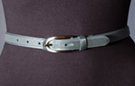 gray 3/4" satin surface feather edge dress belt, 2-1/8" oblong nickel brush buckle, single loop retainer