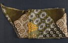 satin belt scarf, arrays of flowers overlaid with abstract husks  in shades of light to dark olive green offset by gold and white