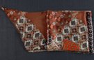 satin belt scarf, arrays of flowers overlaid with abstract husks in coffee, rust and umber