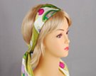 green, purple, pink and white headscarf attached to plastic headband