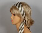 olive green and beige headscarf attached to plastic headband