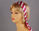 pink and white headscarf attached to plastic headband