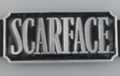 Scarface belt buckle, nickel polish on black