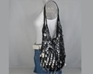 black crochet sling bag spangled with silver tear-drop sequins, sheer lining, magnetic closure