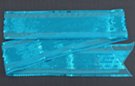 sequin sash, blue sequin band and borders on blue net