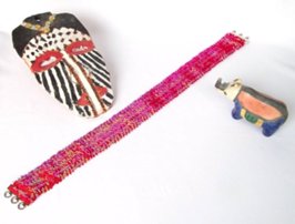 mask and rhino with red sequin stretch belt