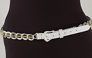 silver chain belt: double links inset with transparent yellow faceted beads; white leather tab with silver buckle