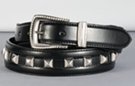 medium wide leather belt with single row of pyramid studs and silvery buckle