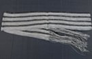 black, gray and white slim scarf, loose weave with foil thread, 4" wide and 66" long plus 9" fringe at ends