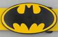 oval bat silhouette black and yellow enameled belt buckle