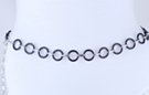 chain belt: smooth black 7/8" rings joined by textured silver chain links; extension chain comprises very small textured oval and circle links tipped by tiny silver drop