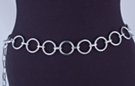 chain belt: smooth silver 1-1/4" rings joined by textured silver chain links; extension chain comprises textured chain links tipped by small silver ball