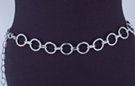 chain belt: smooth silver 1" rings joined by textured silver chain links; extension chain comprises textured oval links tipped by tiny silver ball