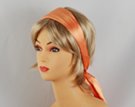 solid orange satin headscarf attached to plastic headband