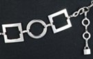 alternating squares and circles silver chain belt with tiny padlock tip