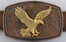 oblong leatherette and bronze belt buckle with golden eagle