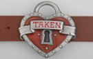 heart-shaped padlock belt buckle with "Taken" on banner