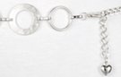 silver chain belt made of textured "washer" rings alternating with circular rings