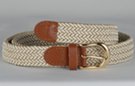 narrow braided woven stretch belt, each chord in braid woven from beige and white thread, tan leather tabs and brass buckle