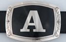 belt buckle with chrome initial "A" on black field