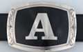 belt buckle with chrome initial "A" on black field