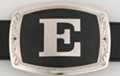 belt buckle with chrome initial "E" on black field