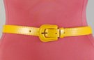 narrow yellow vinyl fashion belt with guitar-shaped buckle