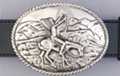 war bonnet rider and horse in moutains on bas-relief belt buckle